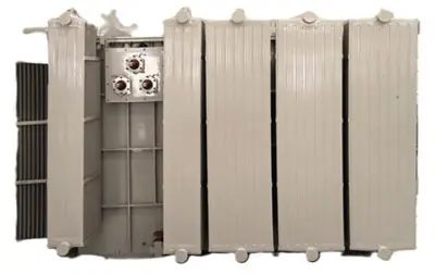 A substation transformer inside the transformer room of a step-up station for solar farms